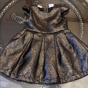 Kardashian kids gold and black dress